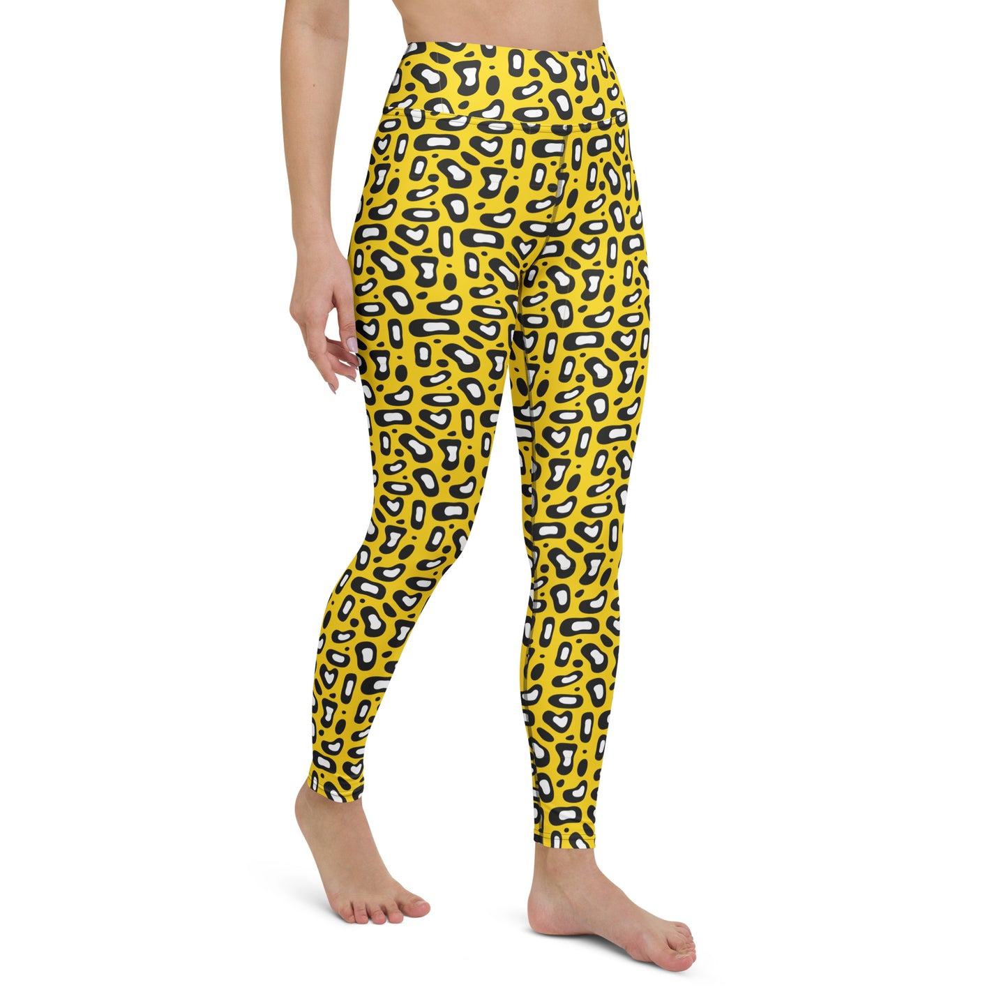 A model wearing high-waisted leggings with a bold yellow, black, and white leopard print pattern, shown from the waist down on a plain white background. Chic Functional Yoga Pants Comfortable Yoga Leggings Bold Yellow Leopard Skin Print Activewear