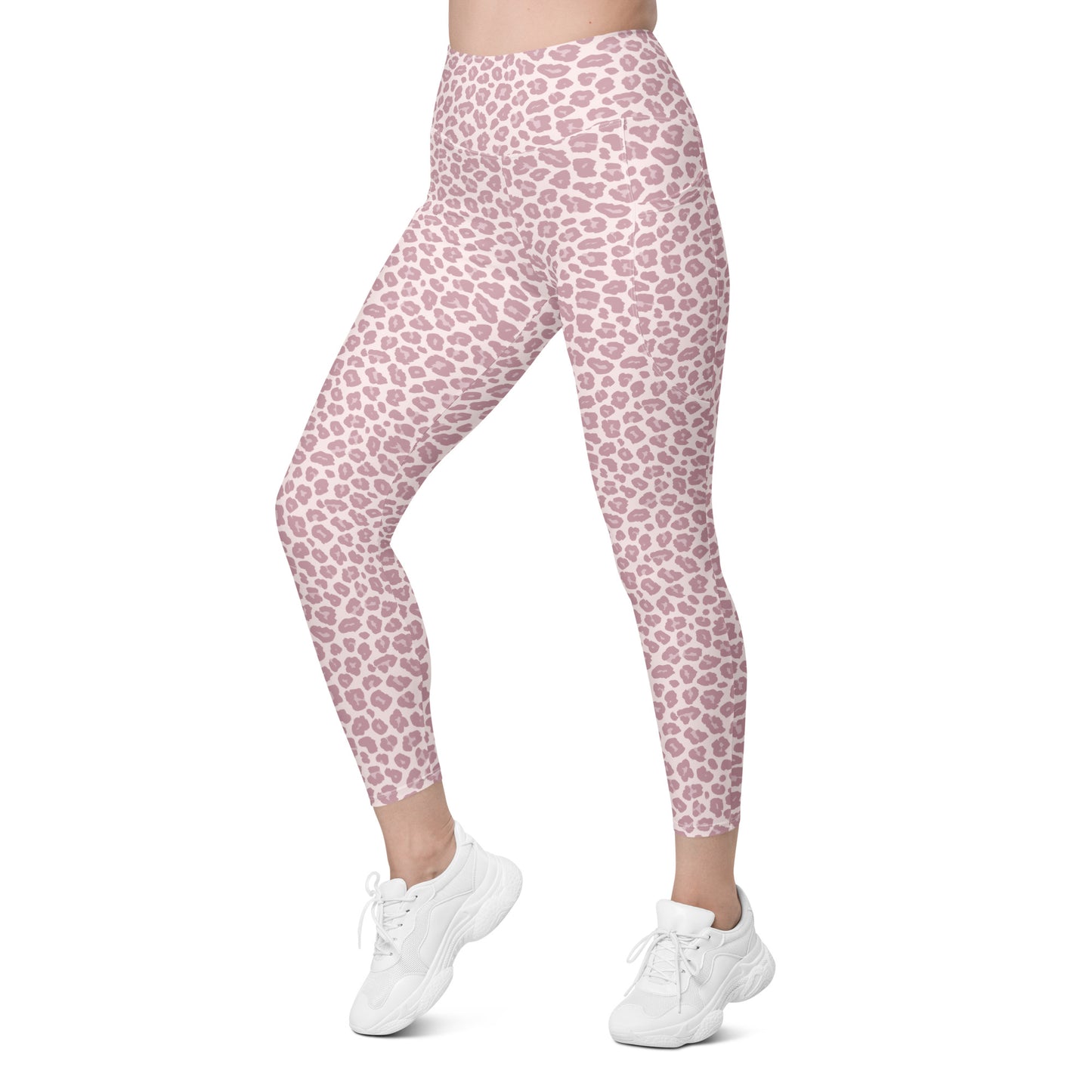 Pink leopard print leggings worn by a model, paired with white sneakers, shown from the waist down on a plain white background. Comfortable Pink Pastel Leopard Print Leggings with Pockets Activewear