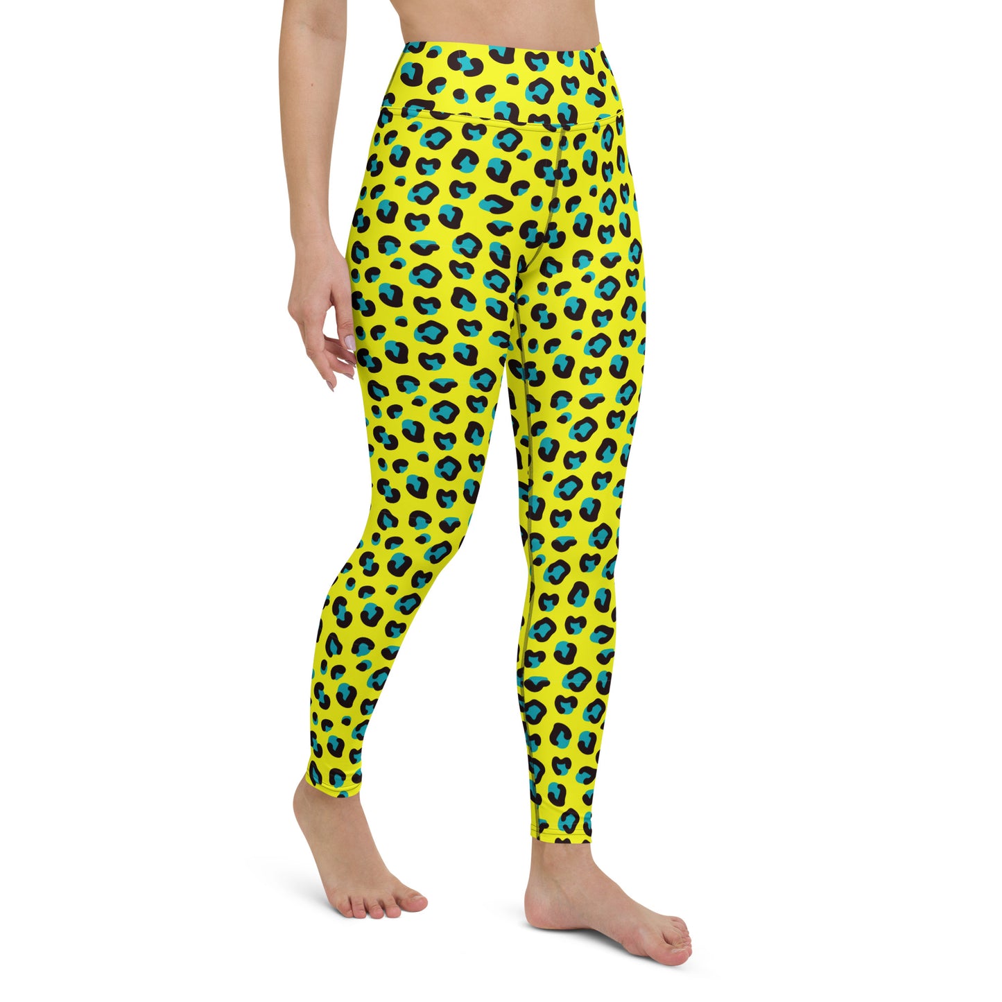 A model wearing bright yellow leggings with a blue and black leopard print pattern, shown from the waist down on a plain white background. Elegant Bold Yellow Teal Leopard Print Yoga Leggings for Activewear