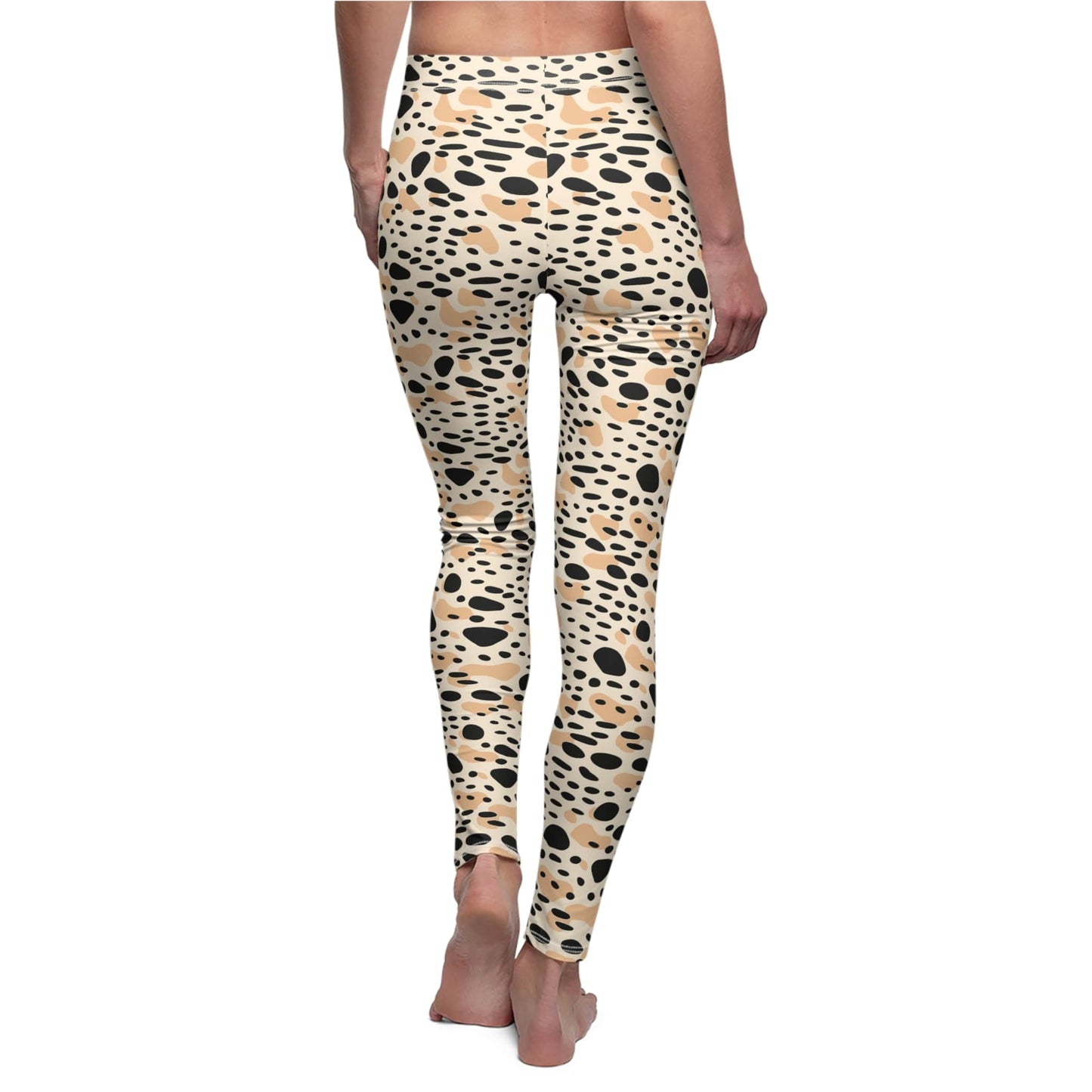 Rear view of a person wearing high-waisted leggings with a beige, black, and tan spotted animal print against a plain white background. Fitness Apparel Bold Beige and Black Spots Leopard Print Leggings Activewear
