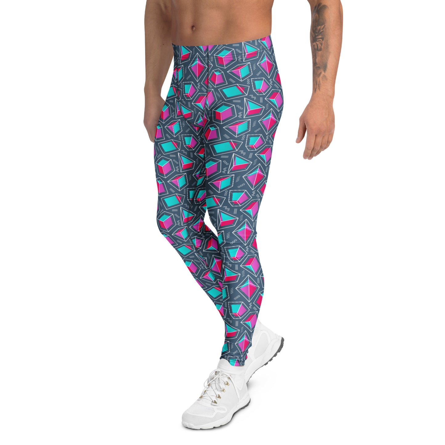 A man wearing high-waisted athletic leggings with a geometric pattern of pink, teal, and white shapes on a dark gray background, paired with white sneakers, shown against a plain white studio background. Comfortable Bold Solid Shapes Geometric Print Men's Leggings Activewear