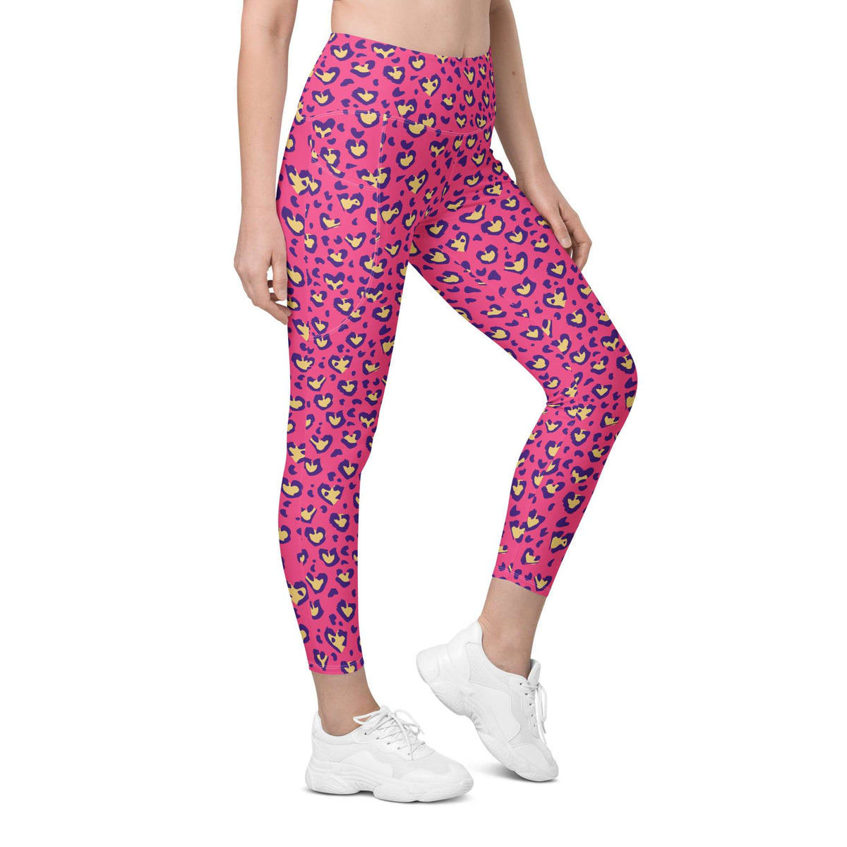 Person wearing pink leggings and white sneakers on a white background Heart Pink Leopard Pattern Leggings with Pockets Activewear Shop Heart Pink Leopard Pattern Leggings with Pockets Activewear, designed for bold workouts, everyday comfort, and convenient storage.