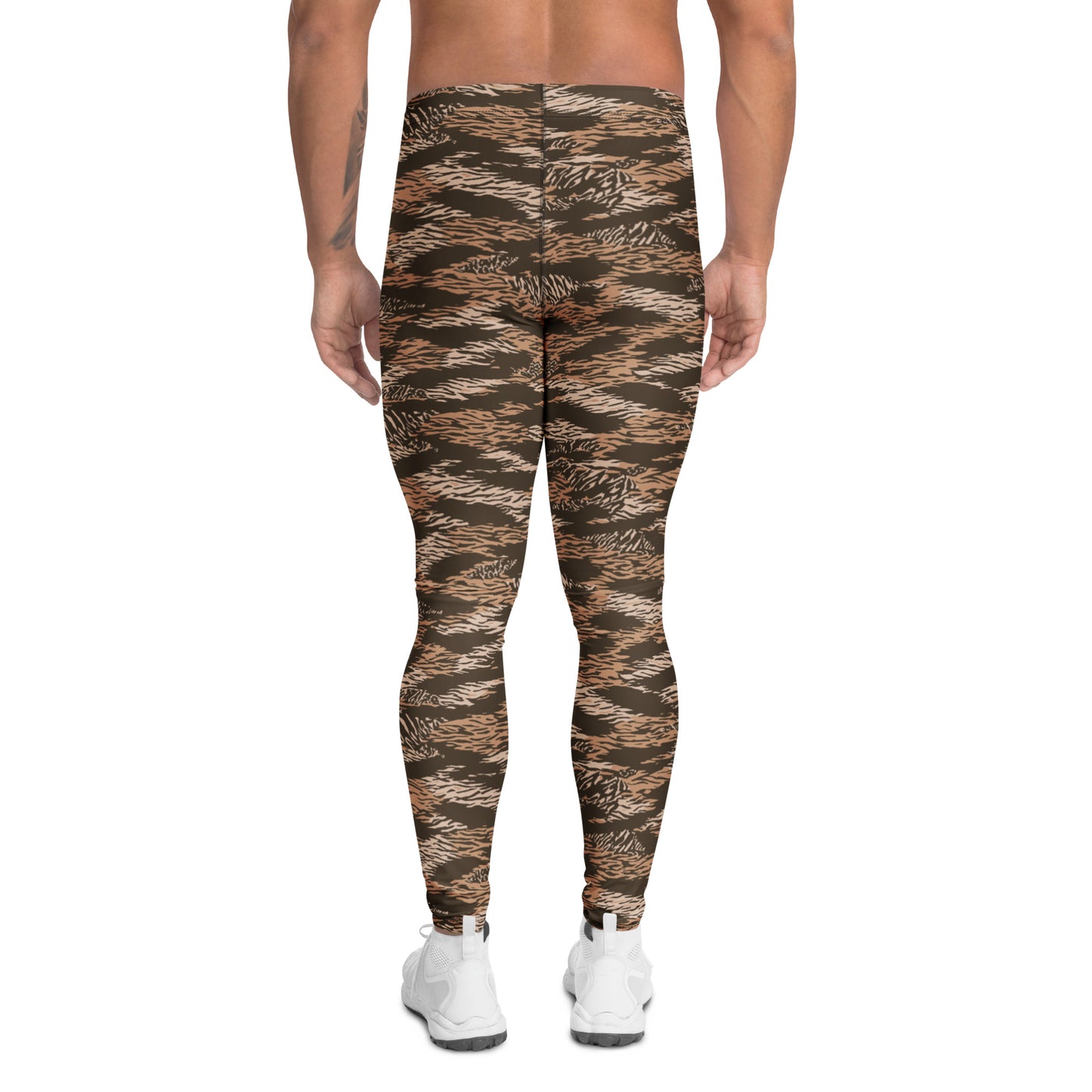 Rear view of a model wearing high-waisted tiger-stripe camouflage leggings in brown, beige, and black, paired with white sneakers on a white background. Artistic Comfortable Bold Brown Tiger Stripes Men's Athletic Leggings