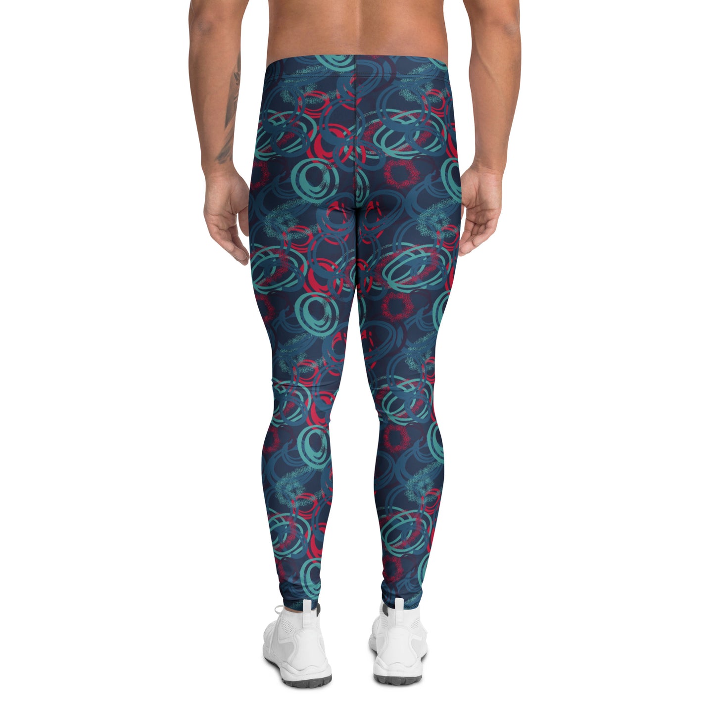 A person shown from the back wearing patterned leggings with a dark navy base and abstract teal and red circular swirls, paired with white sneakers on a plain white background. Bold Vibrant Geometric Shapes Men's Athletic Leggings Activewear