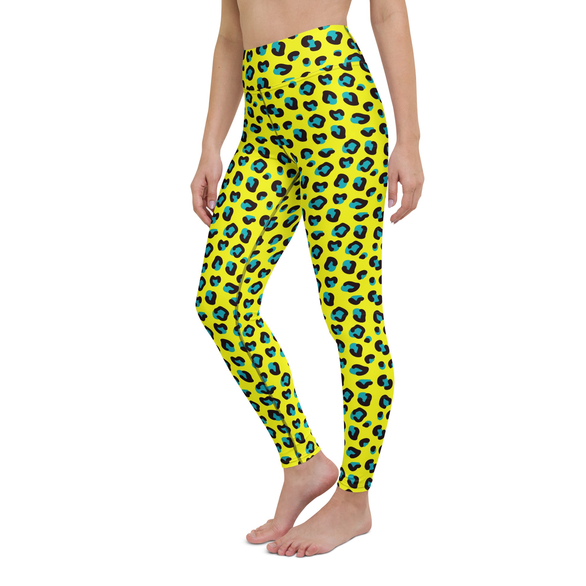 A model wearing bright yellow leggings with a blue and black leopard print pattern, shown from the waist down on a plain white background. Bold Yellow Teal Leopard Print Yoga Leggings Activewear
