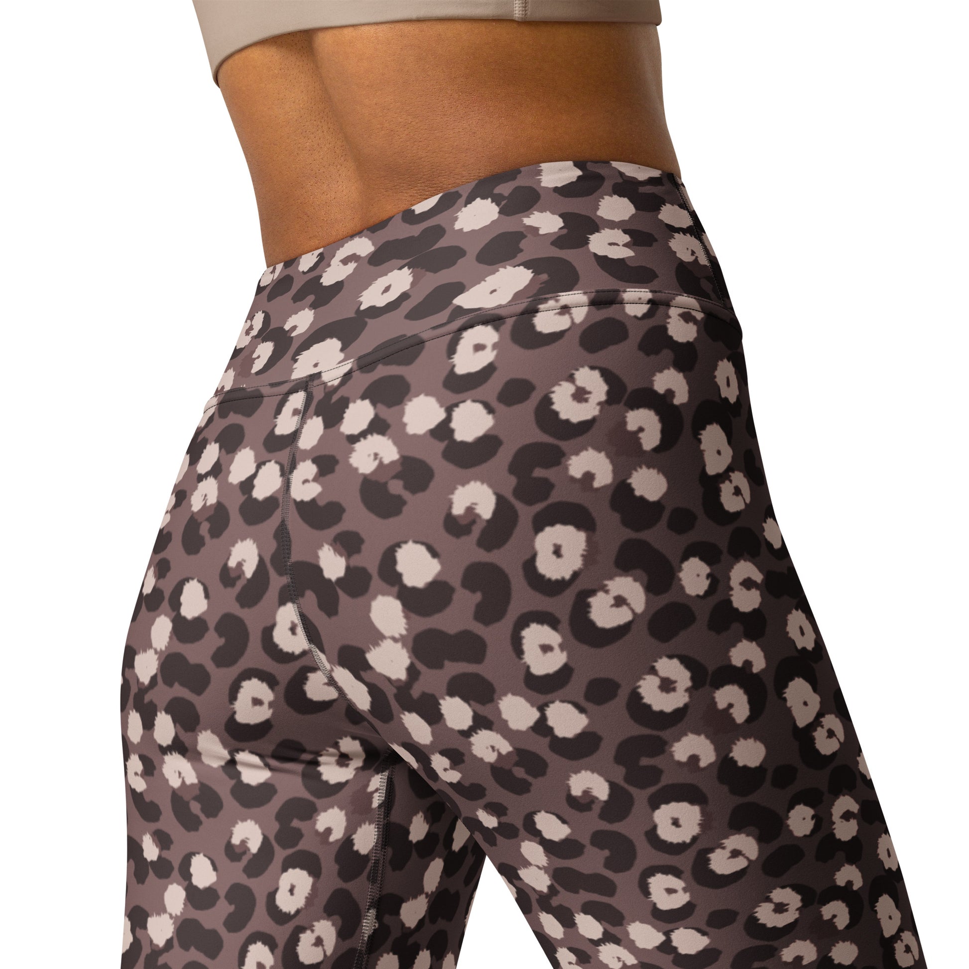 Close-up of a model wearing high-waisted leopard print leggings in a dusty mauve-brown, black, and cream colorway, shown from the side against a plain white background. Chic Durable Bold Brown Leopard Print Yoga Leggings Activewear
