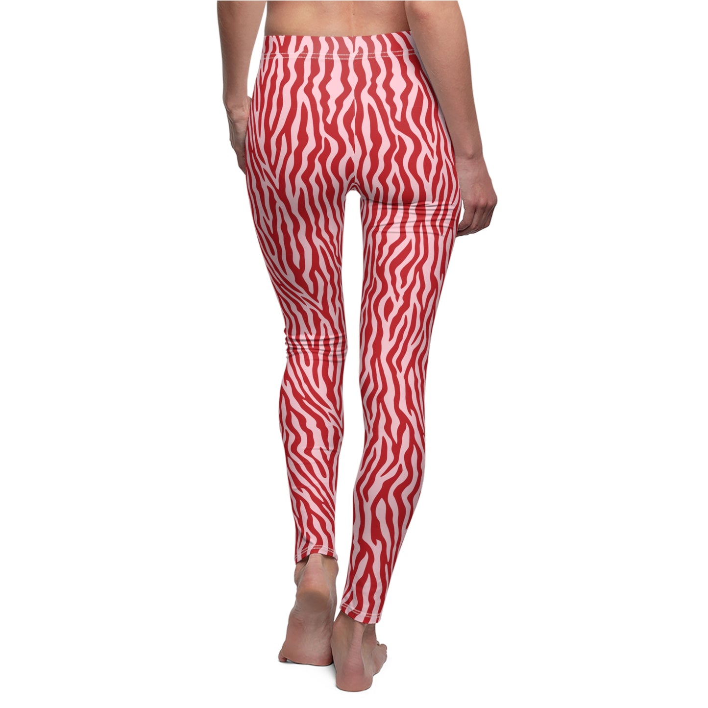 Red and white wavy zebra-print leggings shown on a model from the back, against a plain white background. Chic and Comfortable Zebra Stripe Leggings