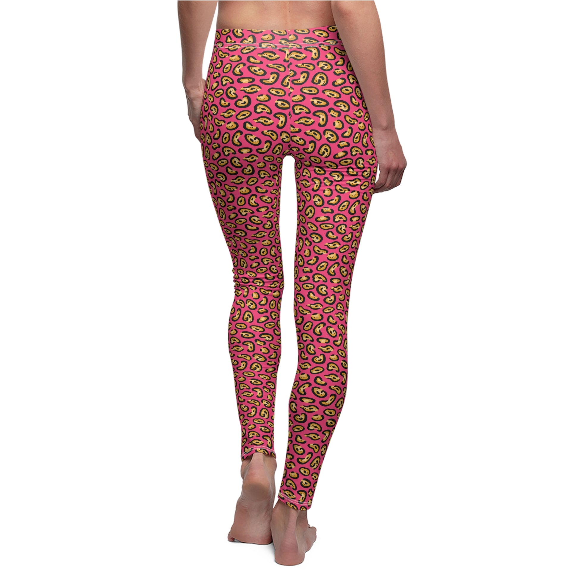 Pink high-waisted leggings with a vibrant green and yellow paisley pattern, shown on a model from the back against a plain white background. Comfortable Bold Chic Pink Leopard Print Elegant Women's Casual Leggings