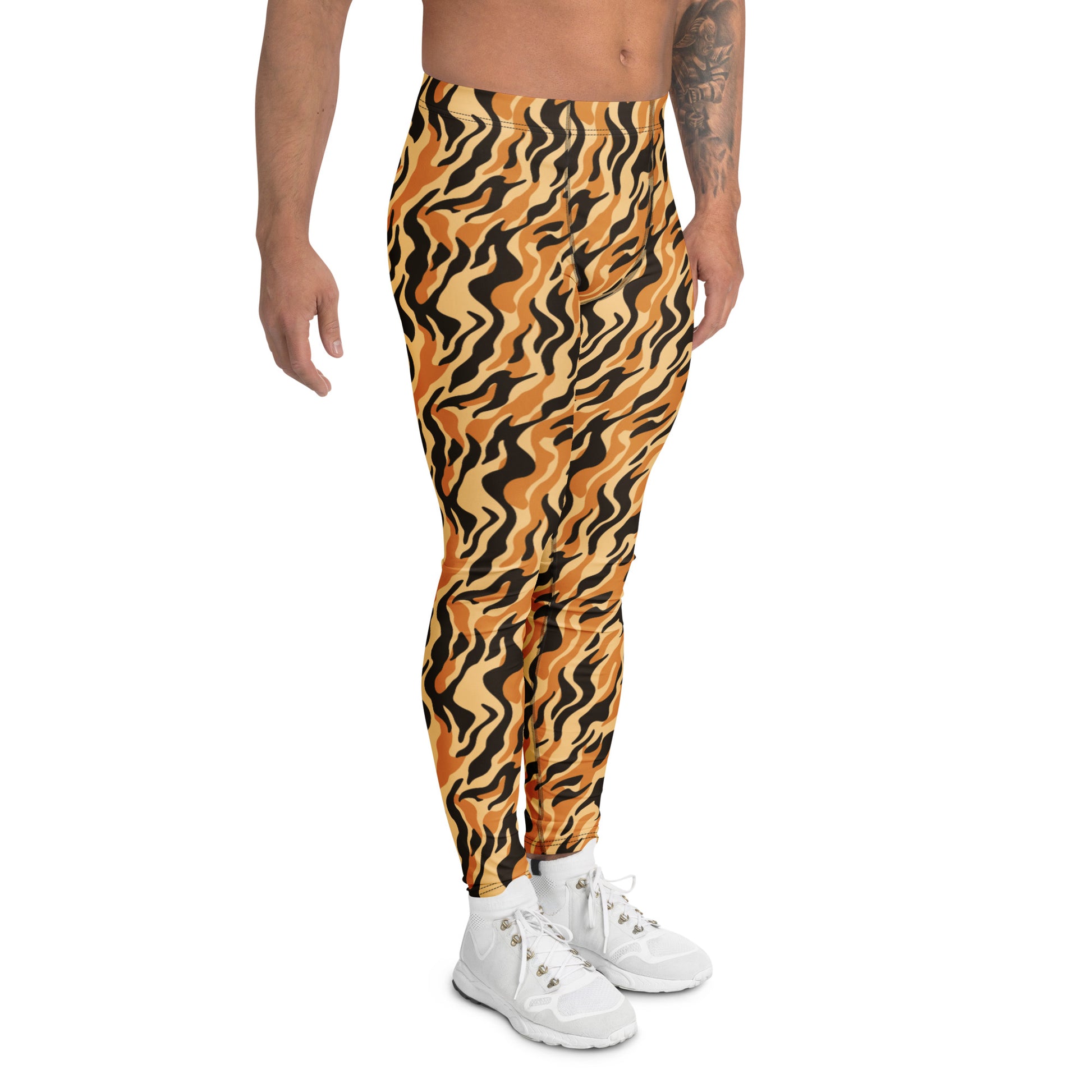 A person modeling high-waisted, full-length athletic pants with a bold wavy abstract pattern in orange, black, and tan, paired with white sneakers against a plain white background. Comfortable Functional Men's Athletic Leggings with Bold Tiger Print for Activewear
