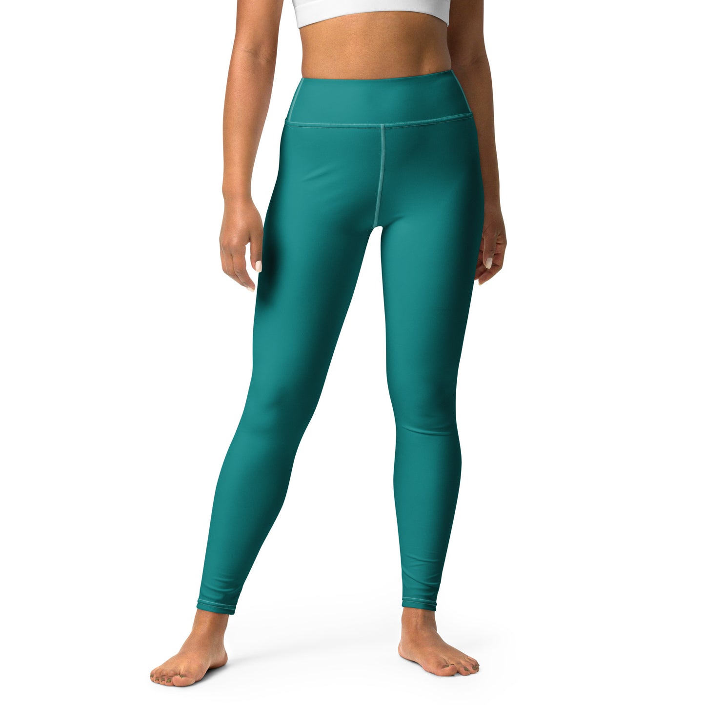 A model wearing high-waisted teal leggings, shown from the waist down against a plain white background. Comfortable Minimalist Plain Solid Color Teal Yoga Leggings
