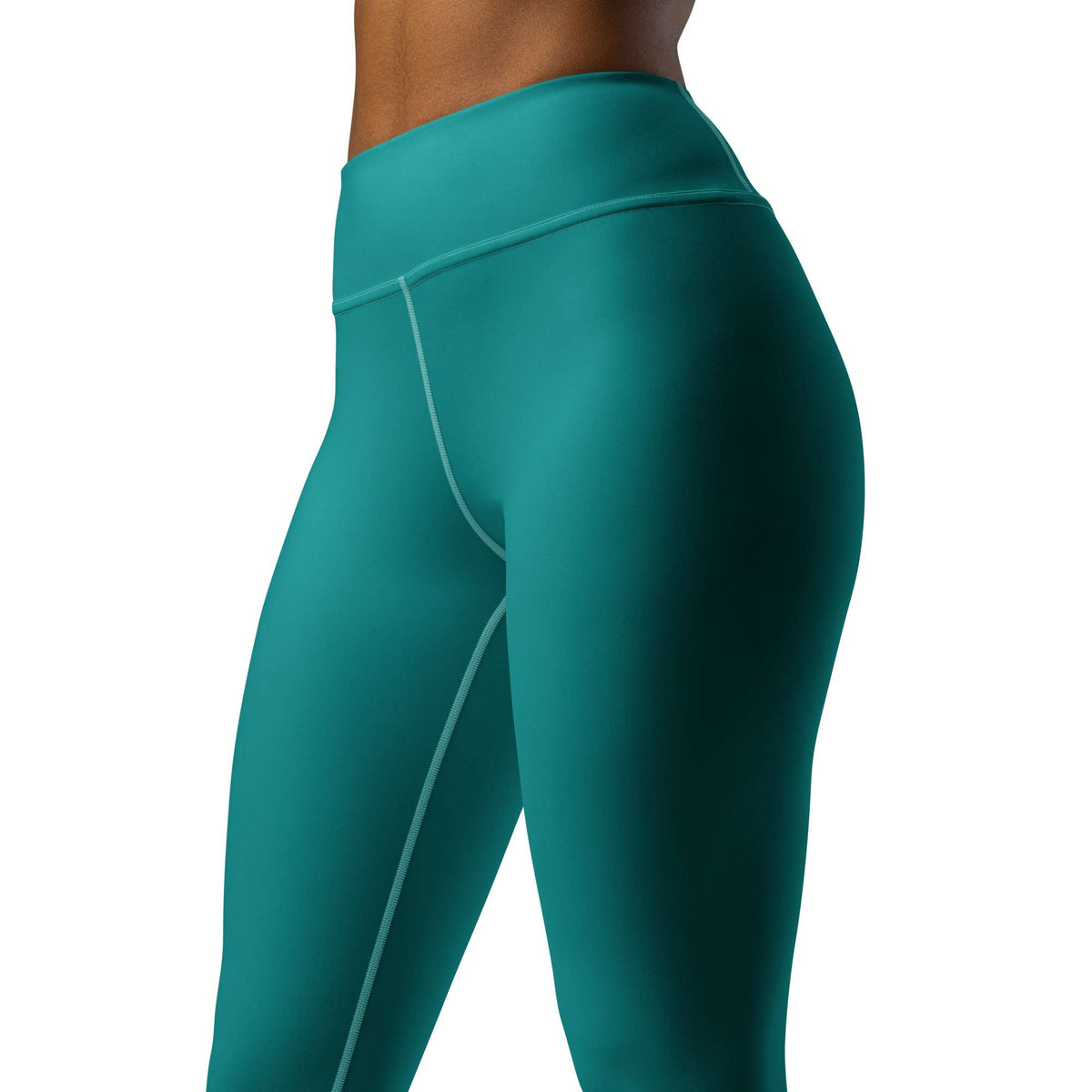 Close-up side view of a person wearing high-waisted teal leggings against a plain white background. Comfortable Minimalist Plain Solid Color Teal Yoga Leggings Activewear