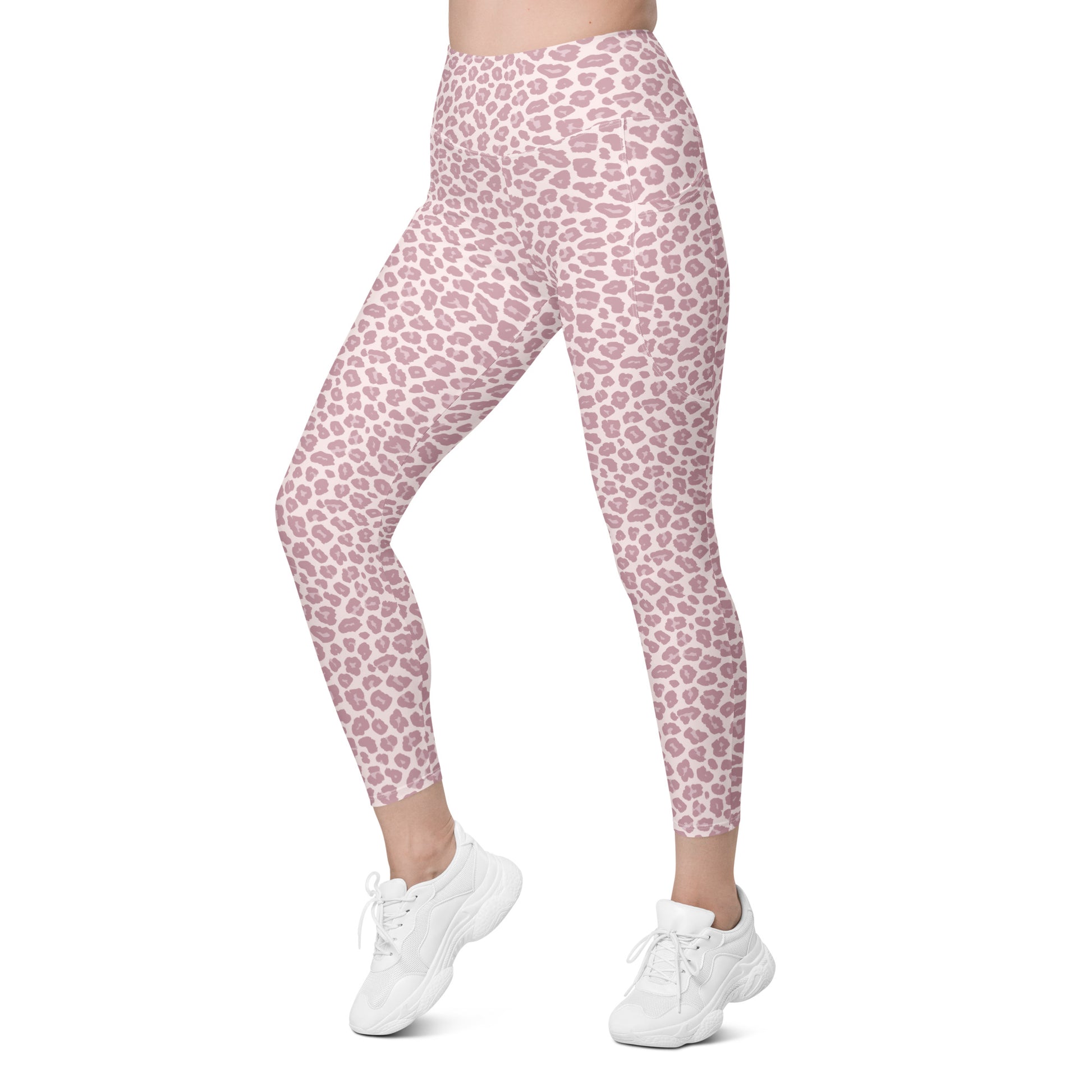 Pink leopard print leggings worn by a model, paired with white sneakers, shown from the waist down on a plain white background. Comfortable Pink Pastel Leopard Print Leggings with Pockets Activewear