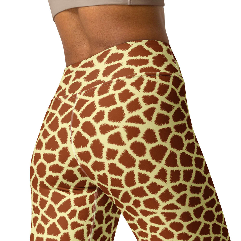 Rear view of a person wearing high-waisted leggings with a giraffe print pattern in brown and cream, against a plain white background. Comfortable Stylish Giraffe Print Yoga Pants for Active Wear