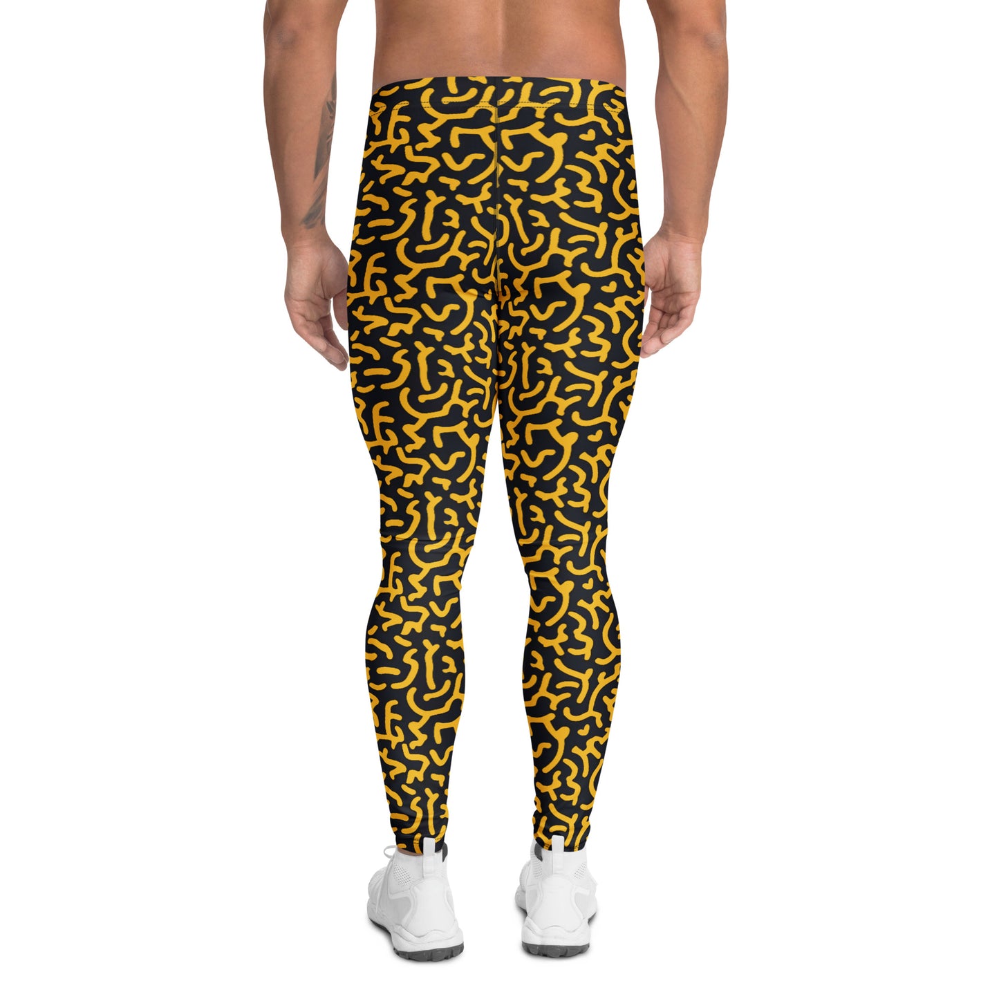 A person shown from the back wearing black leggings with a bold yellow abstract maze-like pattern, paired with white sneakers, on a plain white background. Contemporary Bold Gold Geometric Leggings for Men's Activewear