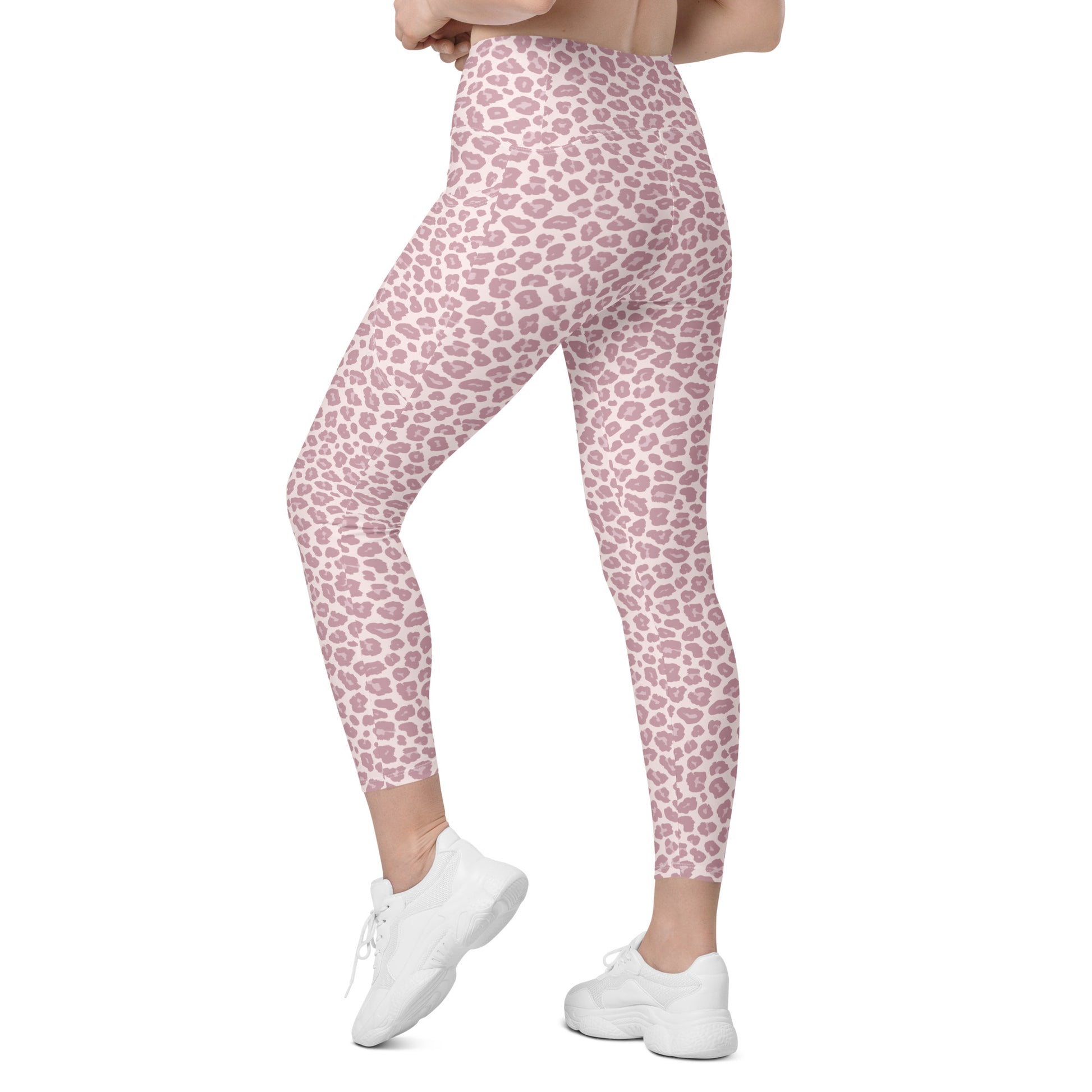 Pink and white leopard print leggings shown on a model from the waist down, paired with white sneakers against a plain white background. Fashionable Pink Pastel Leopard Print Leggings with Pockets Activewear