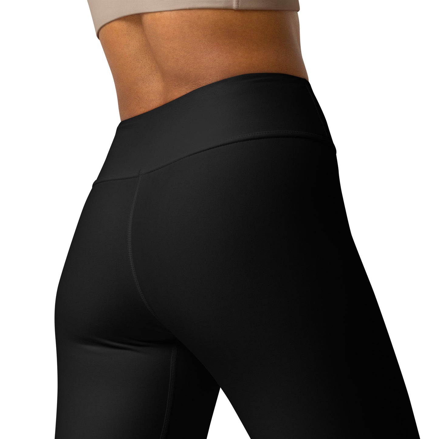 Black leggings worn by a person on a white background Premium Comfortable Essential Solid Black Yoga Pants for Activewear