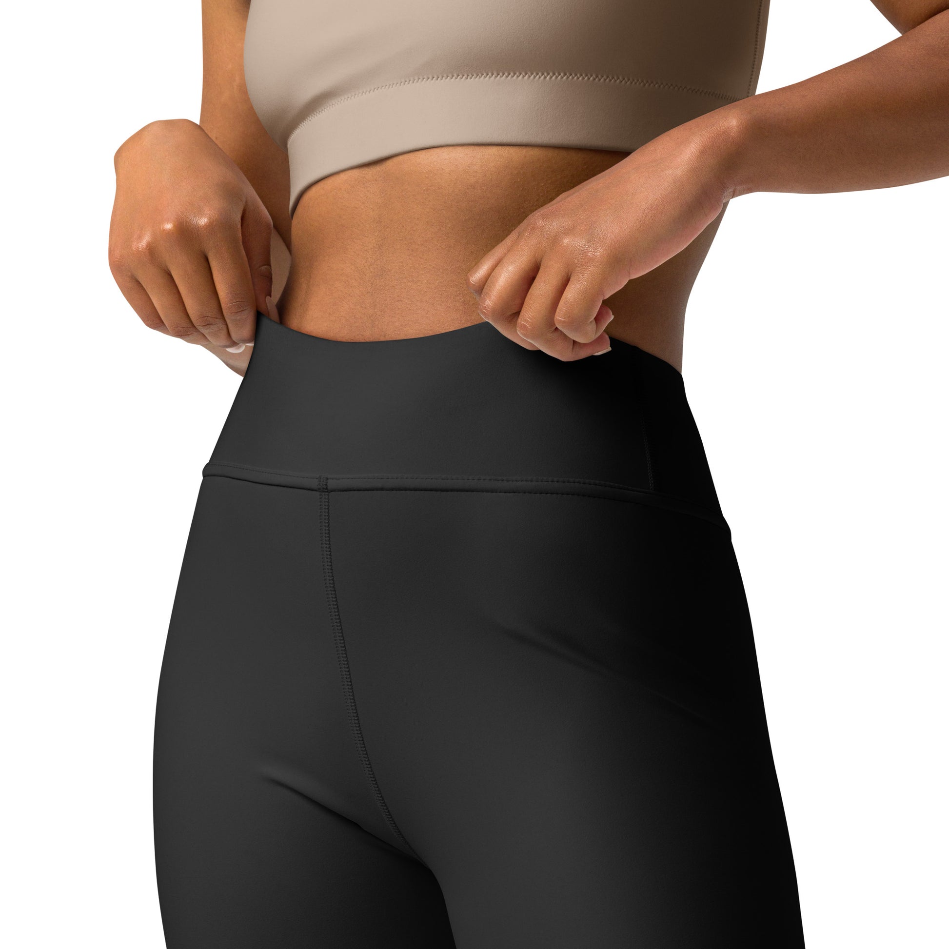 Person wearing black leggings and a beige top on a white background Sleek Comfortable Bold Plain Solid Color Black Pearl Yoga Leggings
