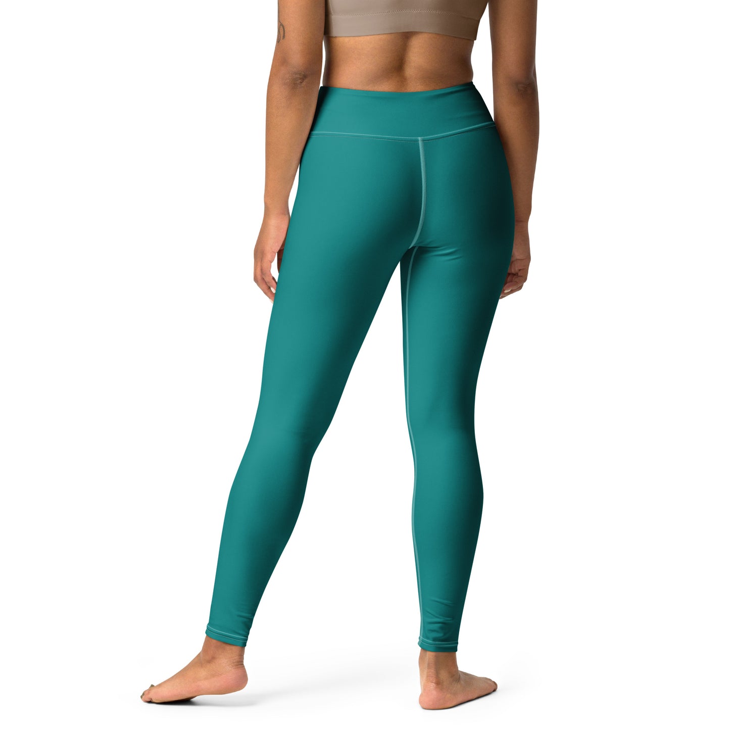 A model from the back wearing high-waisted teal leggings, shown against a plain white studio background. Stylish Comfortable Minimalist Plain Solid Color Teal Yoga Leggings for Activewear