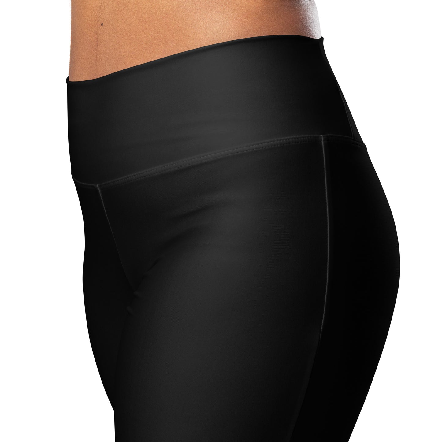 Black leggings worn by a person on a white background Stylish Minimalist Solid Black Flare Leggings for Activewear