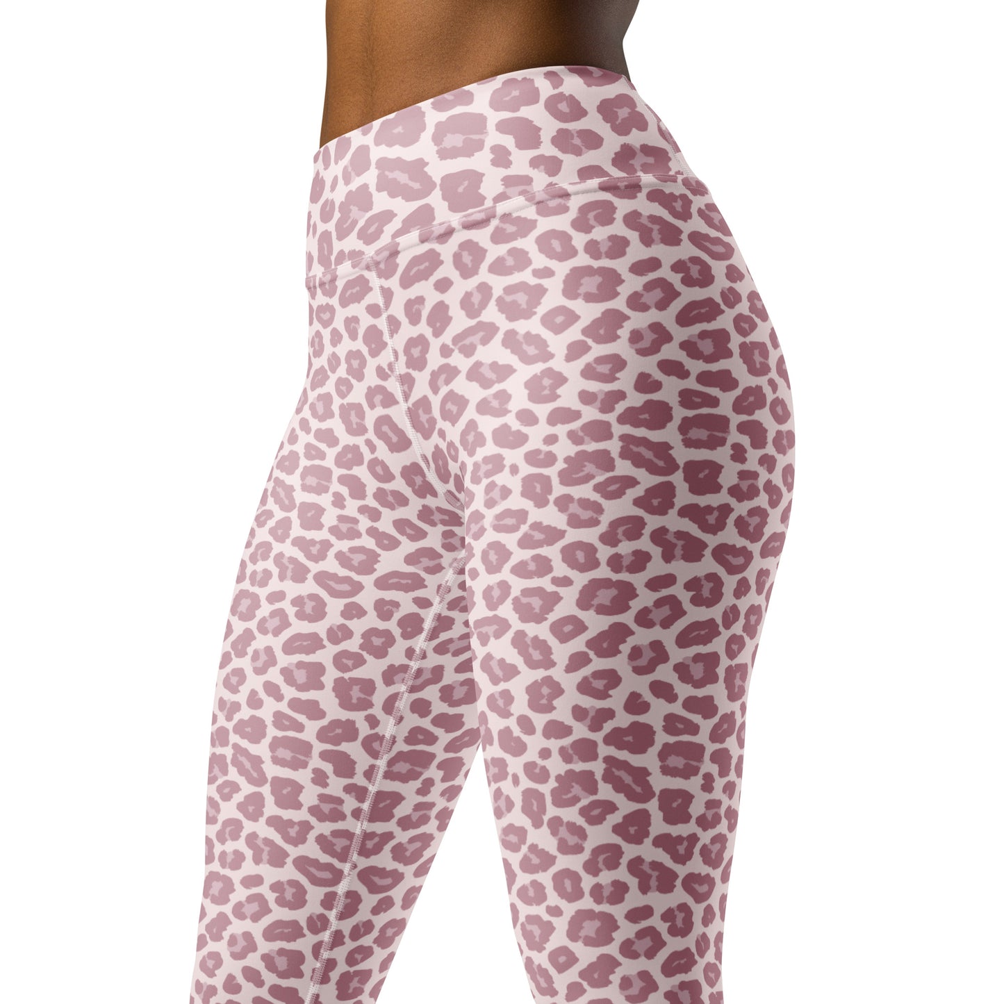 Side view of a person wearing high-waisted leggings with a dusty pink leopard print pattern on a white background. Trendy Chic Pink Leopard Pattern Pastel Yoga Leggings Activewear