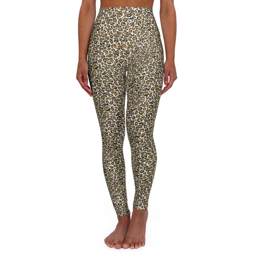A model wearing high-waisted leggings with an all-over leopard print pattern in olive green, brown, black, and beige, shown against a plain white background.