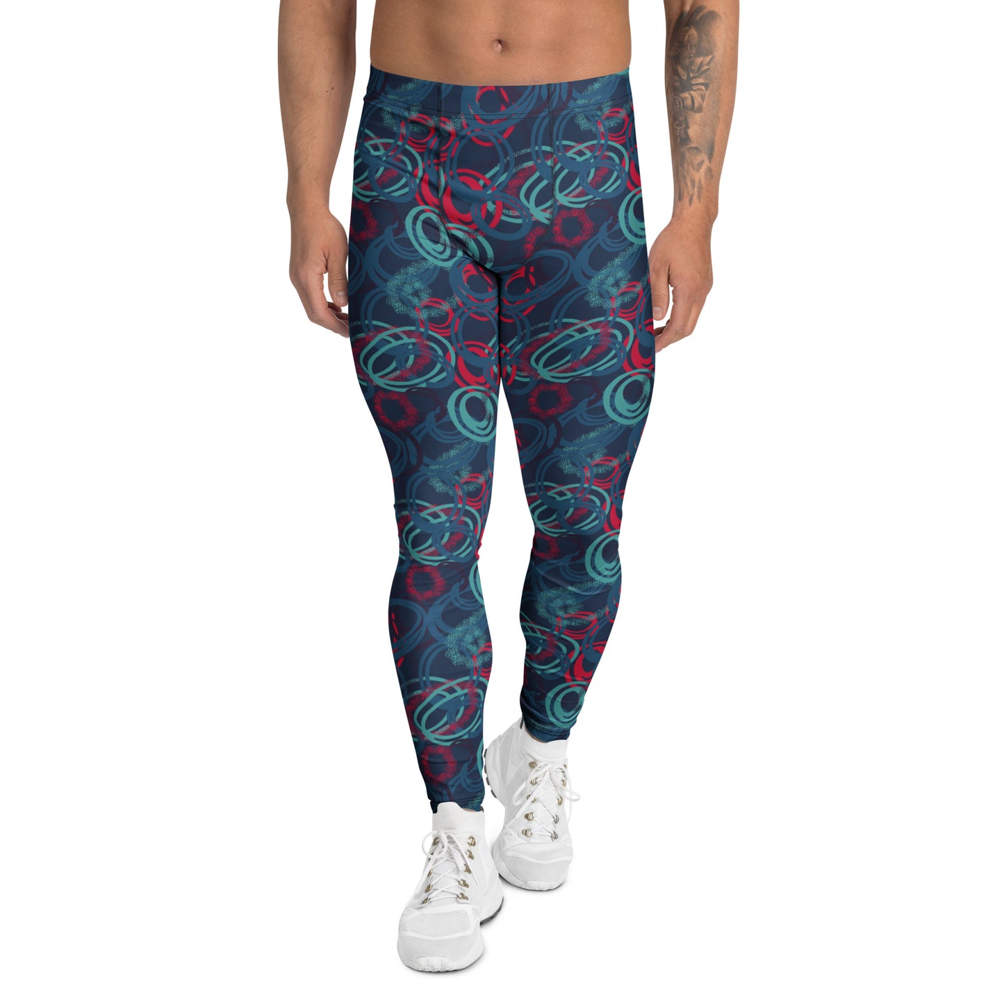 A person modeling high-waisted leggings with an abstract swirl pattern in navy blue, teal, and red, paired with white sneakers against a plain white background. Vibrant Geometric Shapes Men's Athletic Leggings Activewear