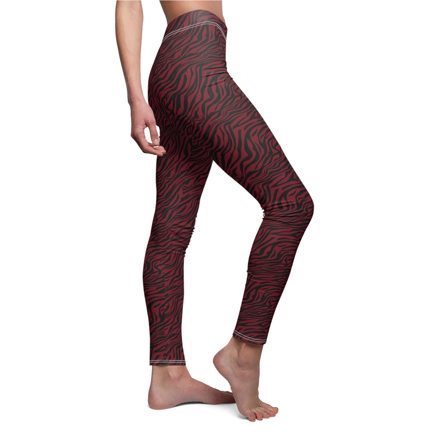 A person modeling high-waisted leggings with a red and black zebra-like abstract pattern, shown from the waist down against a plain white background. Vintage Comfortable Bold Red Zebra Print Women's Casual Leggings