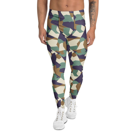 A person modeling high-waisted geometric camouflage leggings with white sneakers against a plain white studio background. Bold Colorful Camouflage Geometric Men's Leggings Activewear Shop Bold Colorful Camouflage Geometric Men's Leggings with a standout print, flexible fit, and all-day comfort for workouts or streetwear.
