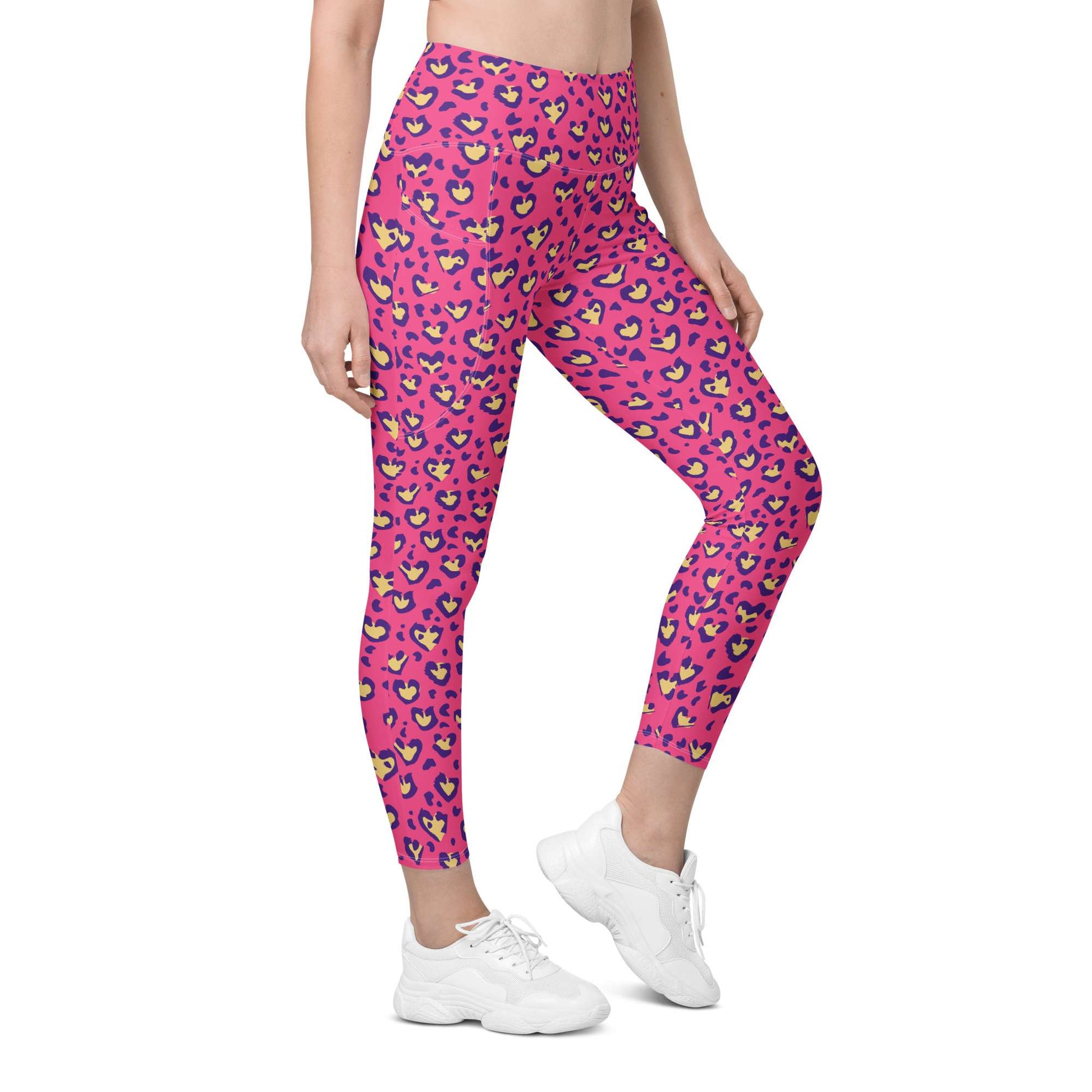 Person wearing pink leggings and white sneakers on a white background Heart Pink Leopard Pattern Leggings with Pockets Activewear Shop Heart Pink Leopard Pattern Leggings with Pockets Activewear, designed for bold workouts, everyday comfort, and convenient storage.