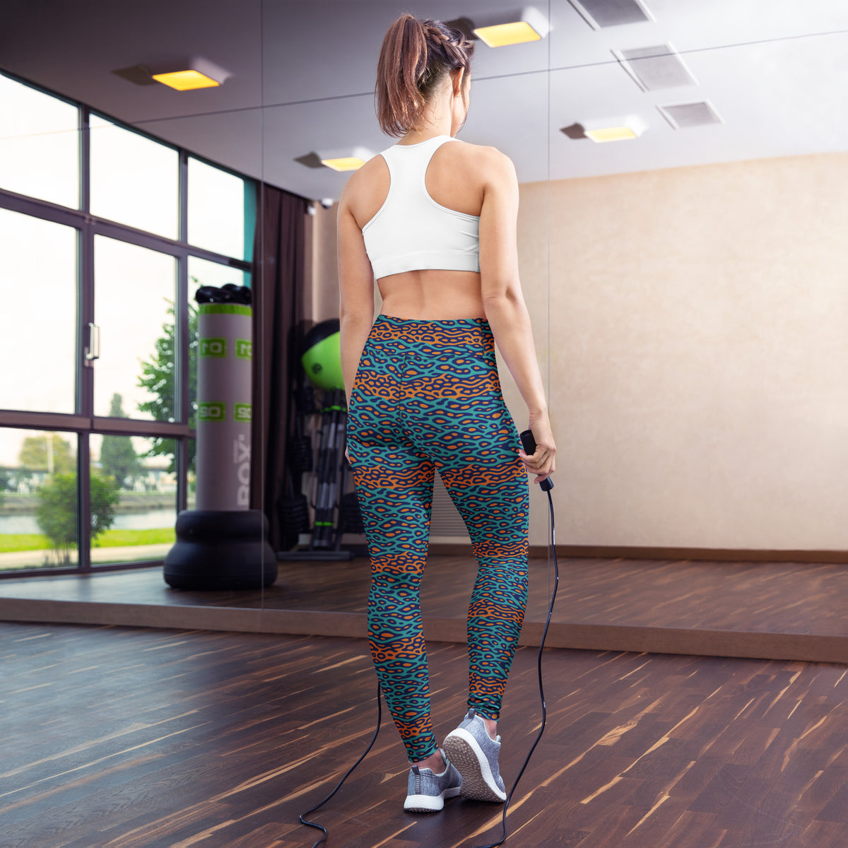 Shop the perfect blend of style and comfort with our Bold Wavy Leopard Pattern Yoga Leggings. Designed for activewear enthusiasts, these leggings feature a striking wavy leopard print that adds a unique, dynamic look to your workout wardrobe. Crafted from high-quality, stretchy fabric, they provide excellent support and flexibility for yoga, running, or any fitness activity. The breathable material ensures you stay cool and comfortable, while the bold pattern makes a fashion statement wherever you go. Eleva